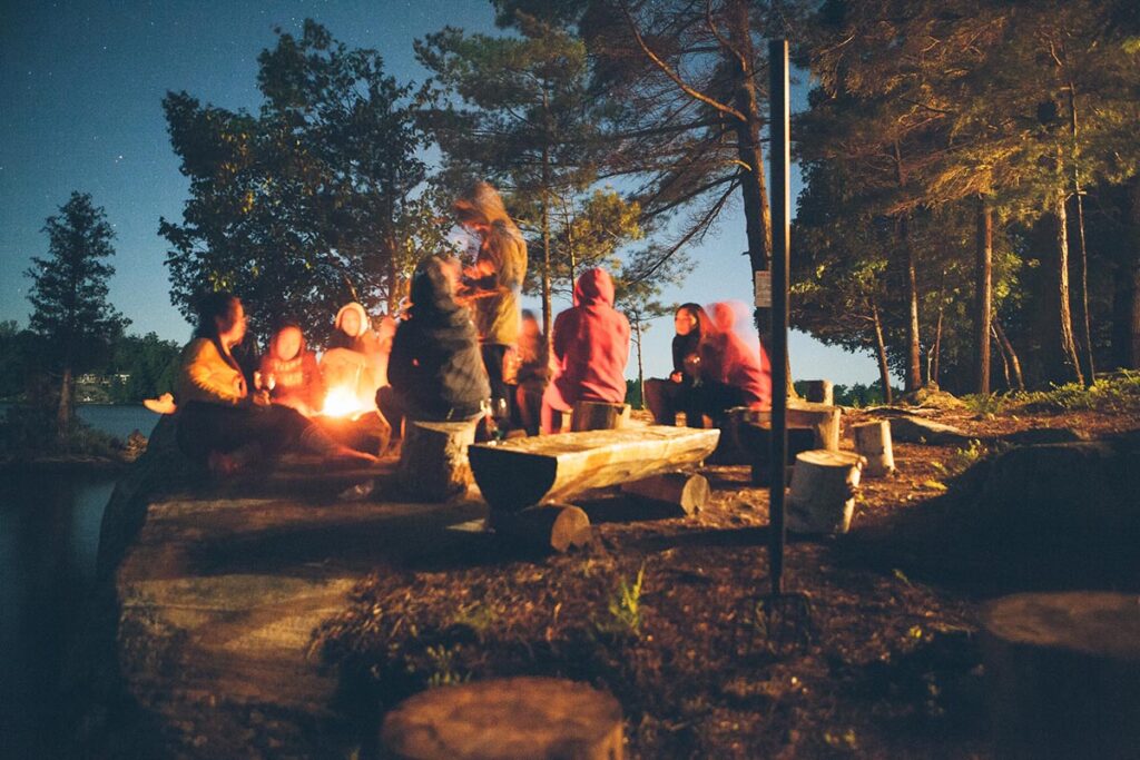Group around a campfire in the evening